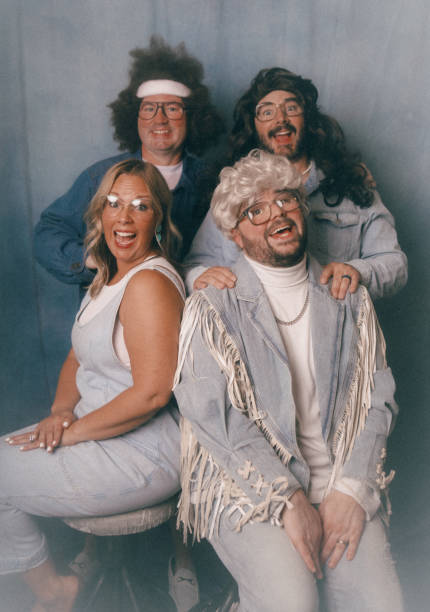 istock Awkward Retro Glamour Shots Of Denim Dressed Siblings 2199466225
