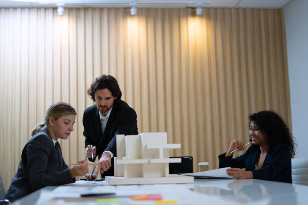 istock Group of architect meeting and brainstorming. 2199471198