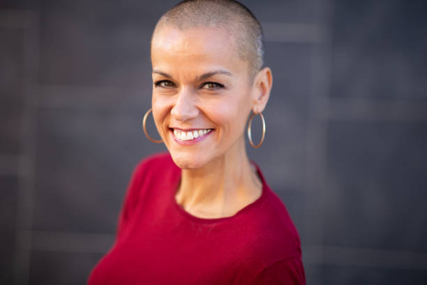 istock close up happy woman smiling and looking at camera 2199472054