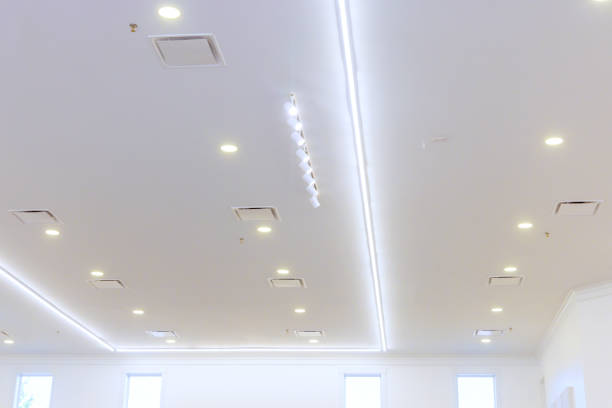 istock Elegant interior of a well-lit modern space featuring sleek ceiling design and soft ambient lighting 2199476407