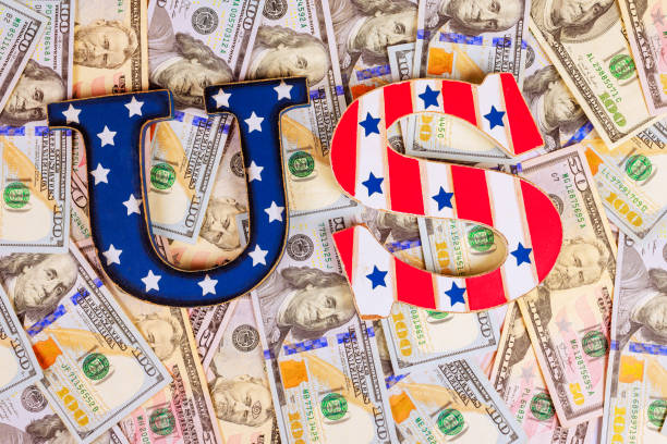 istock Letters representing US dollars displayed on a background of banknotes showcasing wealth and financial themes 2199476463