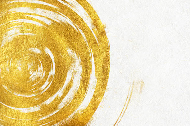 gold abstract pattern on white Japanese paper.