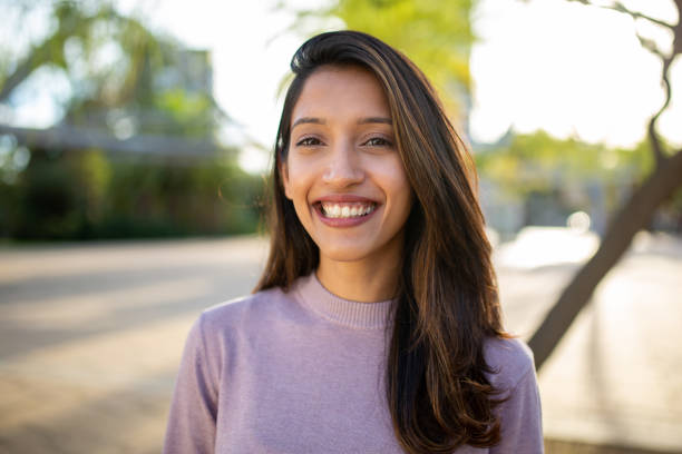 istock Close up portrait smiling young woman 2199483414