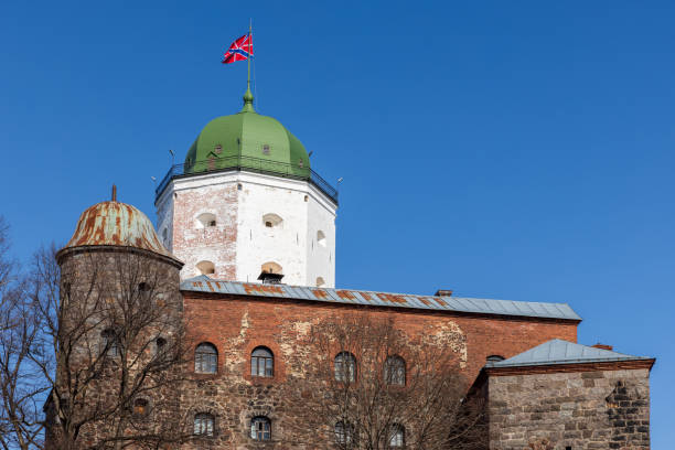istock Vyborg Castle exterior under blue sky on a sunny winter day 2199485885