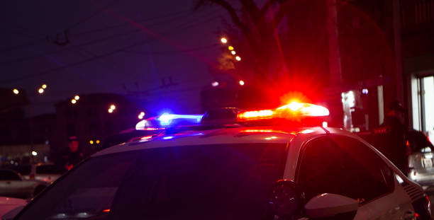 istock Police car in the night city 2199488074