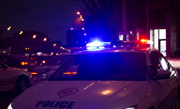 istock Police car in the night city 2199488085