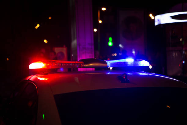 istock Police car in the night city 2199488156