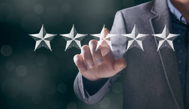 istock Star rating concept. Stars from the net. Man tapping on the screen 2199488282