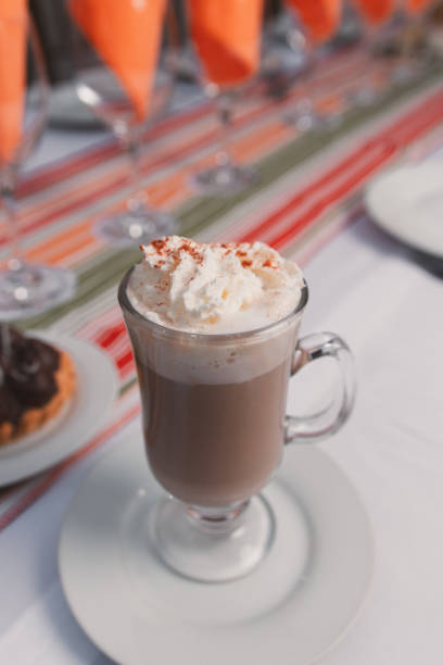 Two cups of hot chocolate with whipped cream for the Christmas holidays