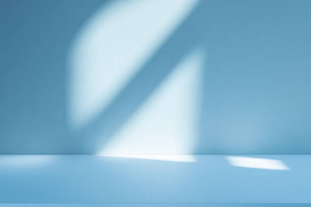 istock Studio style background wall decoration presentation uses white and blue tones. with shadows cast from a nearby window, concept creating a decorative 2199507548