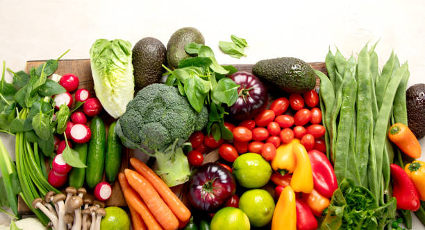 istock Assortment of fresh organic vegetables in rainbow colors. 2199521914
