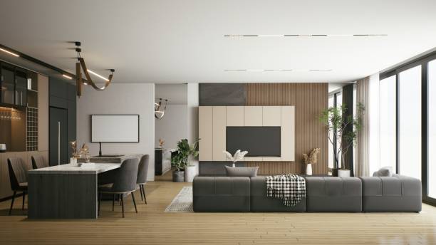 istock A modern, open-concept living space featuring a sleek sofa, dining area, and large windows, with a blend of natural wood and contemporary design elements. 3d rendering. 2199526050