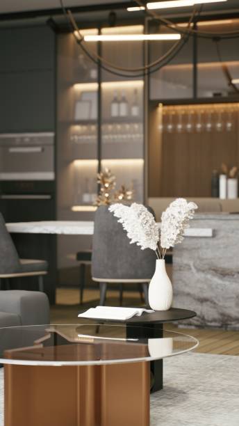istock A modern living space featuring elegant furniture, a stylish coffee table, and decorative elements, creating a sophisticated ambiance. 3d rendering. 2199526145