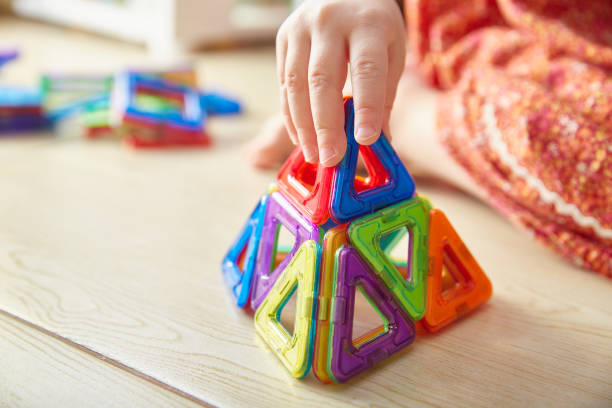istock Close-up of a triangle from a children's magnetic color constructor 2199531676