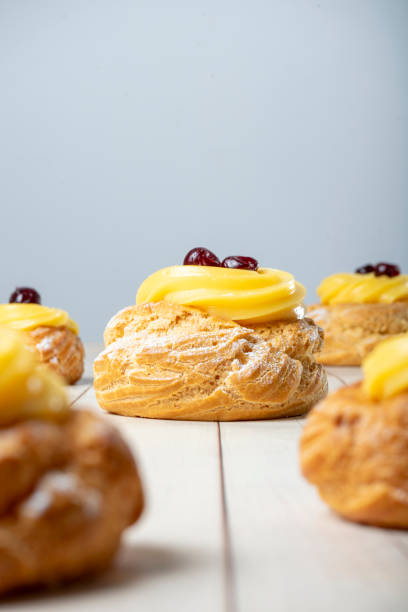 istock San Giuseppe zeppole with cream and black cherry 2199539918