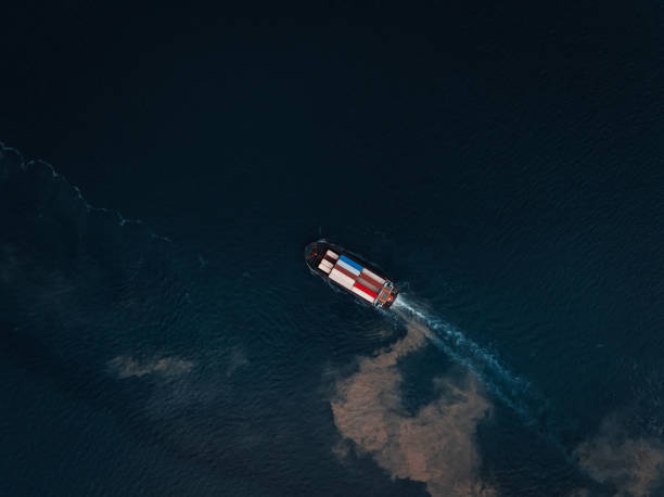 istock cargo logistic container ship sailing in black sea import export goods and distributing products to dealer consumers across Asia pacific and worldwide. global business transportation by container ship, top view 2199540581
