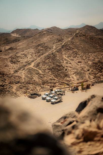istock Desert landscape with off-road vehicles. 2199545771