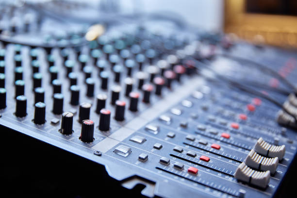 istock Mixing console close-up with a small depth of field in the background light. 2199547377