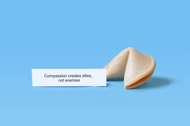 istock Fortune cookie withtext saying 'Compassion creates allies, not enemies 2199550406