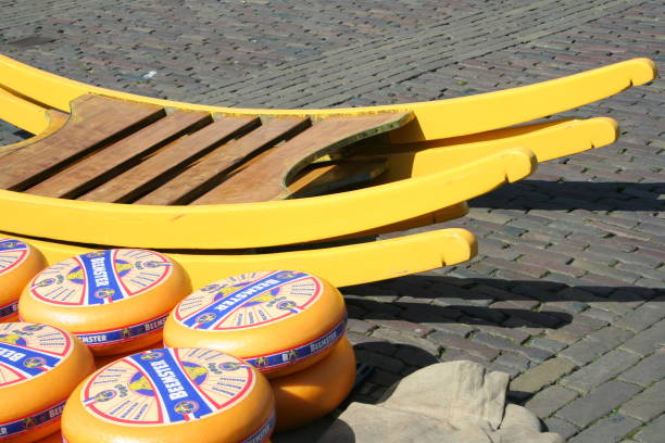 alkmaar,Netherlands,North Holland,Duch, june 2016: Cheese and cheese-carriers on the folkloristic chees market in Alkmaar, Holland