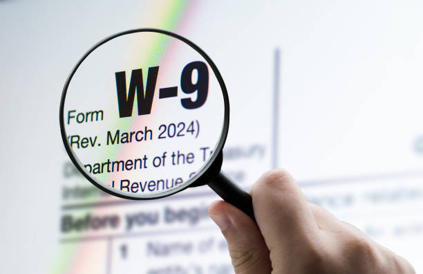 istock Focusing on the W-9 IRS tax form 2199553257
