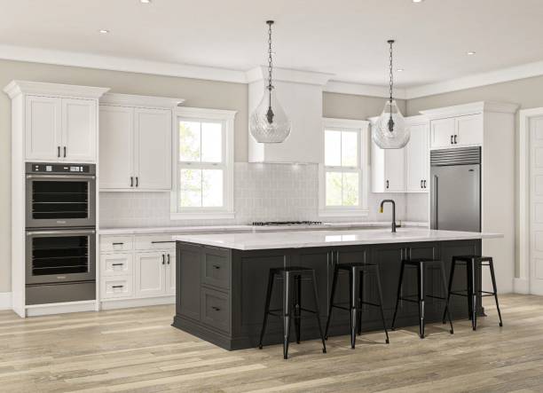 istock Modern White And Black Kitchen Interior With Large Island And Pendant Lighting 2199555323