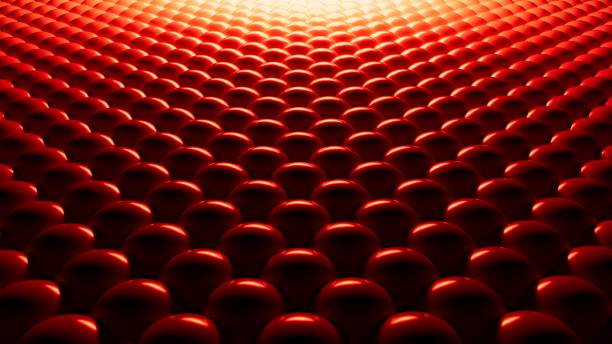 istock Abstract background of glossy red spheres, 3D rendering with light and shadow effect, futuristic texture, geometric pattern, shiny balls, digital visualization, red volumetric backdrop 2199555803
