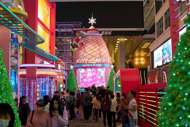 Hong Kong, China - December 5, 2023: Harbour City's Merry Spacemas open-air zone. Harbour City is a shopping centre in Tsim Sha Tsui, Kowloon, featuring festive decorations and lights.