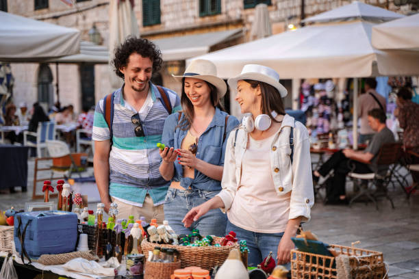 istock Young Adults Enjoying Market in Dubrovnik 2199557108