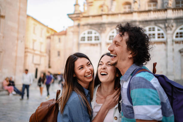 istock Young Adults Laughing Together in Dubrovnik 2199557163
