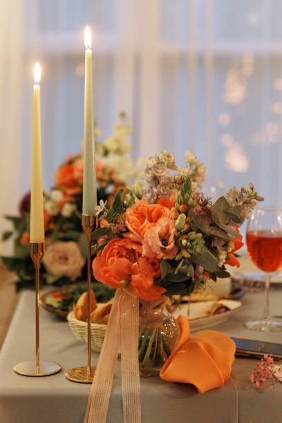 istock Beautiful, decorated table with flower decorations and candles. Christmas evening or wedding party decoration. 2199557834