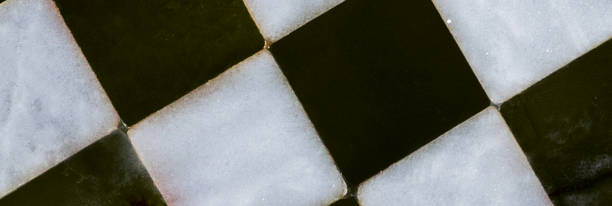 istock Close up of empty chessboard background. Top view. 2199558284