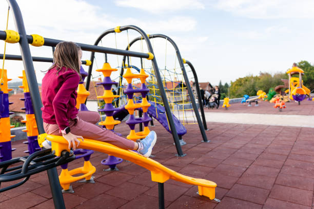 istock A child is playing on the playground 2199559033