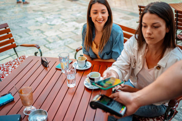 istock Young Adults Enjoying Coffee and Digital Payment in Dubrovnik 2199559542