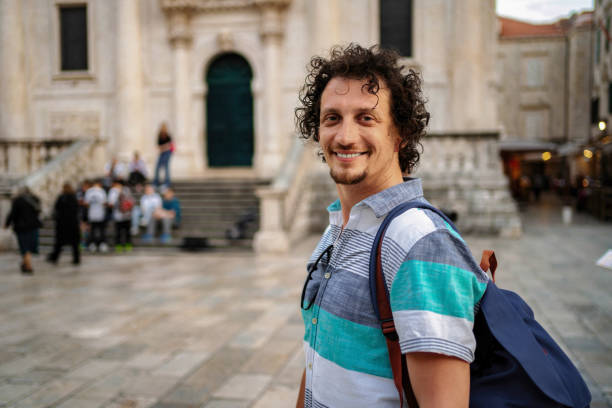 istock Smiling Traveler Exploring Historic Dubrovnik Streets 2199561192