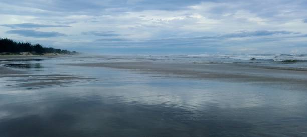 istock beach photography on a cloudy day 2199561204