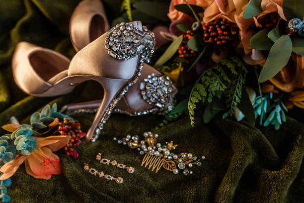 istock Wedding accessories of the bride on green background 2199566179