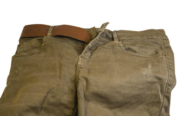 khaki jeans with brown belt isolated