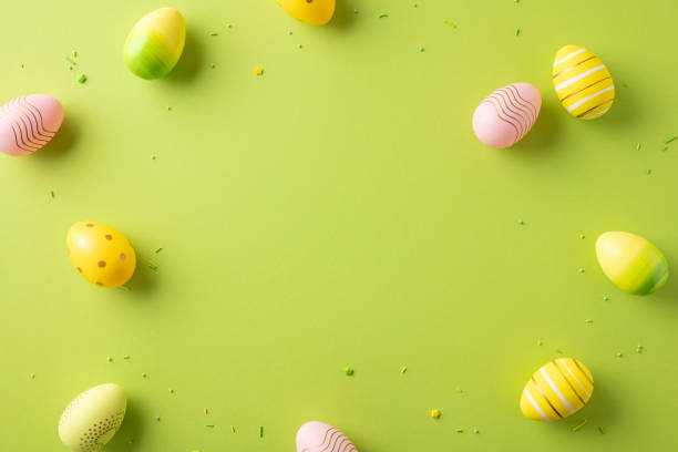 istock Colorful Easter eggs with intricate designs placed on a bright green surface, evoking festive and seasonal vibes 2199569547