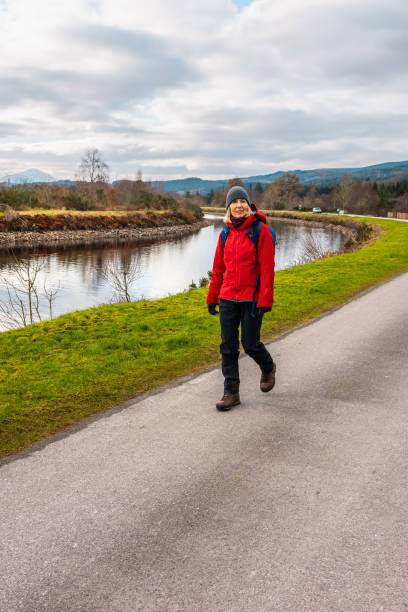 istock Hiker on the Great Glen Way at Fort Augustus, Scotland 2199572261