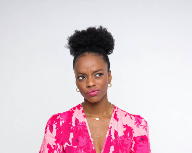 Headshot of confused woman