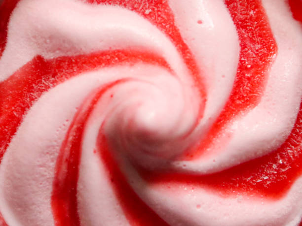 istock Close up view of twisted ice cream with strawberry jam 2199591778