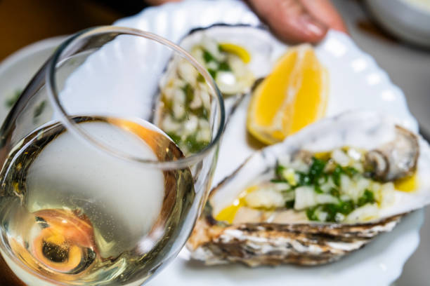 istock white wine at the raw oyster cuisine 2199592260