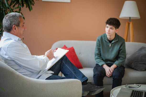 istock Young woman in a psychotherapy session 2199592700