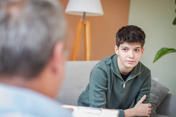 istock Young woman in a psychotherapy session 2199592745