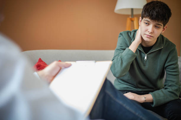istock Young woman in a psychotherapy session 2199592833