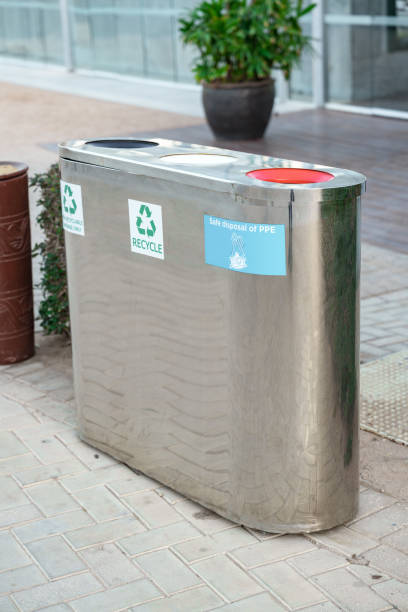 istock Recycling and Safe Disposal Station for PPE Located Outside a Modern Building 2199597570