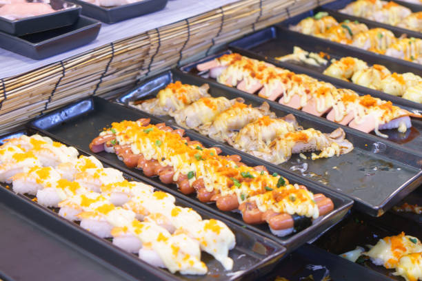 istock Colorful Assortment of Sushi with Various Toppings 2199600716