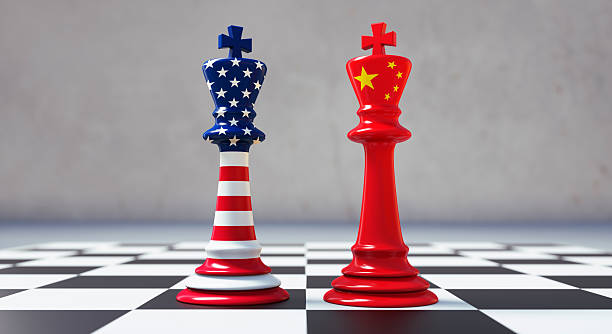 istock Chess pieces king with USA and China flags 2199601312