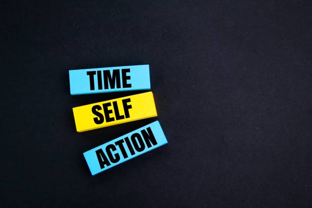 istock create changes in yourself with the words time, self and action. Self discipline. time management concept. concept word for success 2199603388
